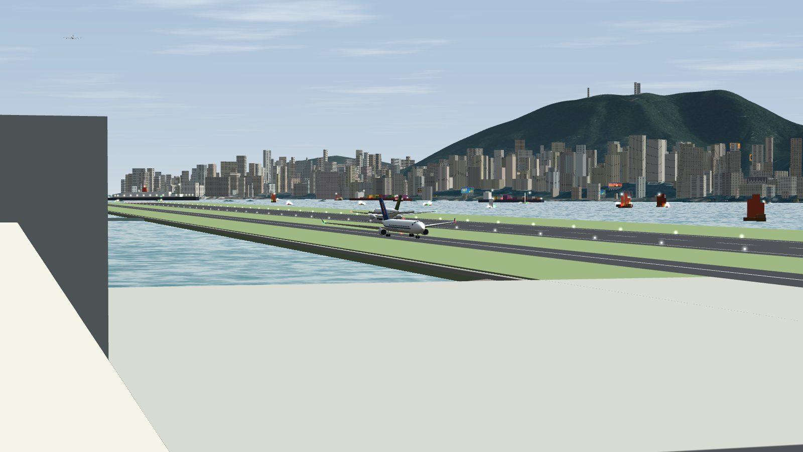 View from the car park roof along the runway with a jet taxiing on the taxiway.