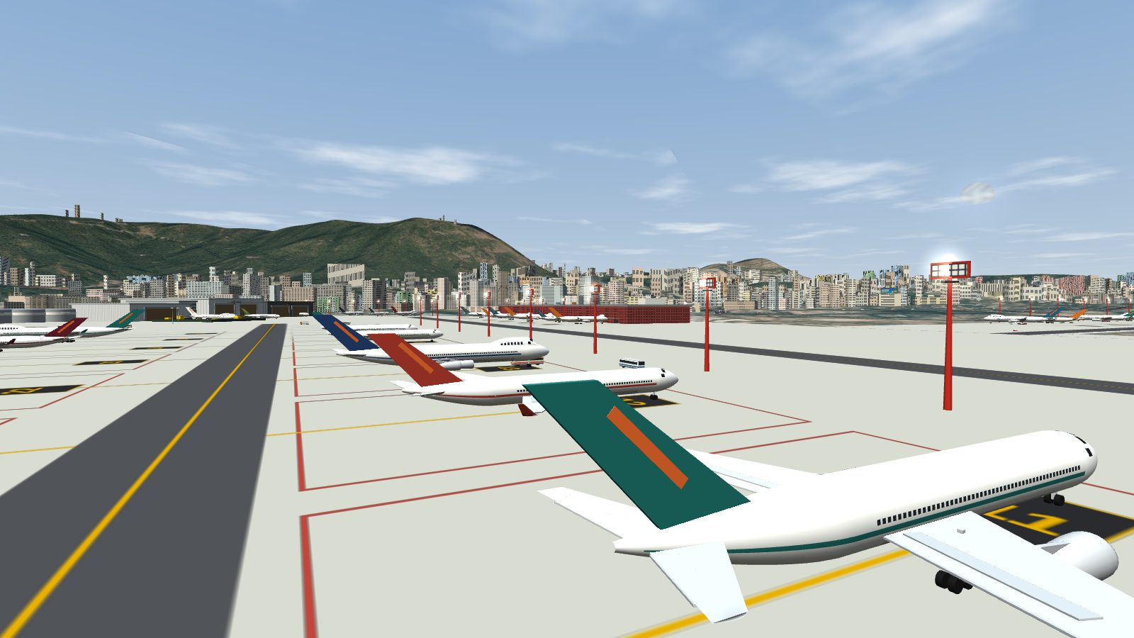 Red floodlight masts with lamp frames standing past the noses of aircraft parked on the remote stands at Kai Tak.