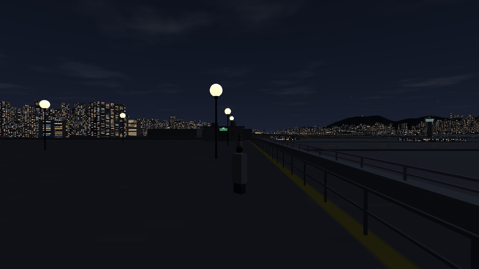 The car park roof at night with glowing white globe lamps and a pipe railing along the parapet.