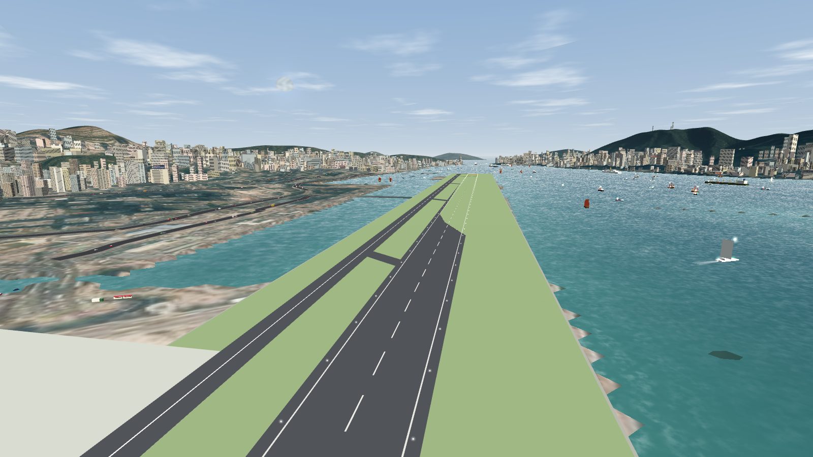 Looking along Runway 13 from above, with bitumen link strips crossing the grass between the runway and the parallel taxiway.
