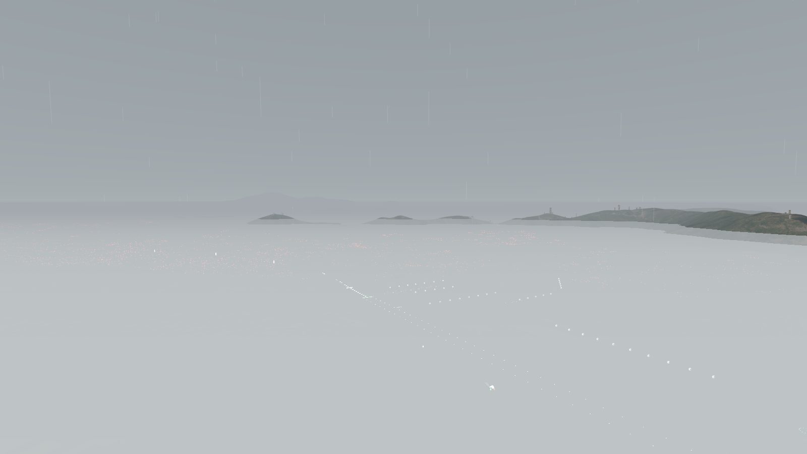 The same view of Kai Tak and Kowloon in low cloud, with the hills hidden in grey.