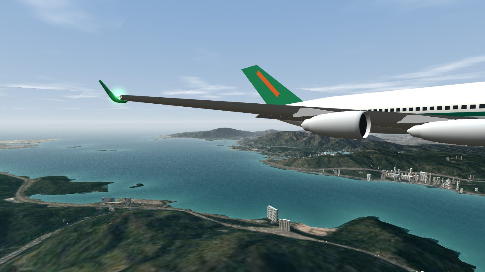 The new A340-300 wingtip: a thin wing ending in a green winglet that curves up and sweeps back.