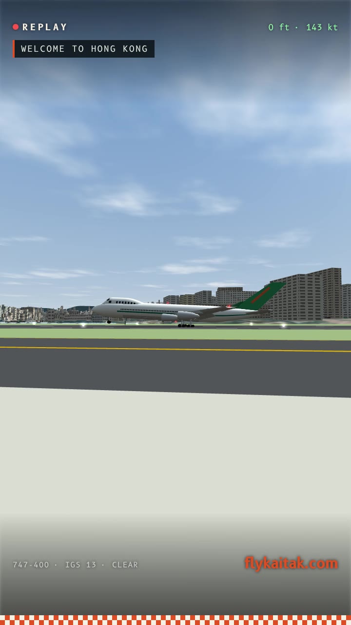 A frame from a portrait replay video: a 747 just after touchdown, with the REPLAY tag at the top and flykaitak.com at the bottom.