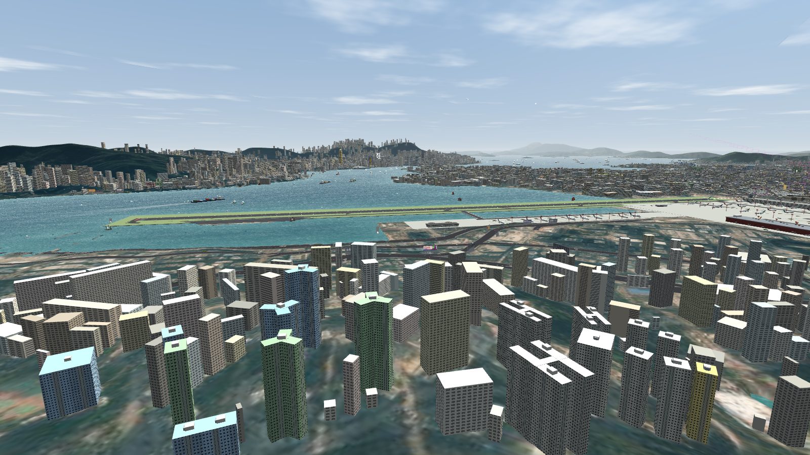 Over Kwun Tong looking west: the Kwun Tong Bypass along the waterfront, the runway across the typhoon shelter and the harbour beyond.