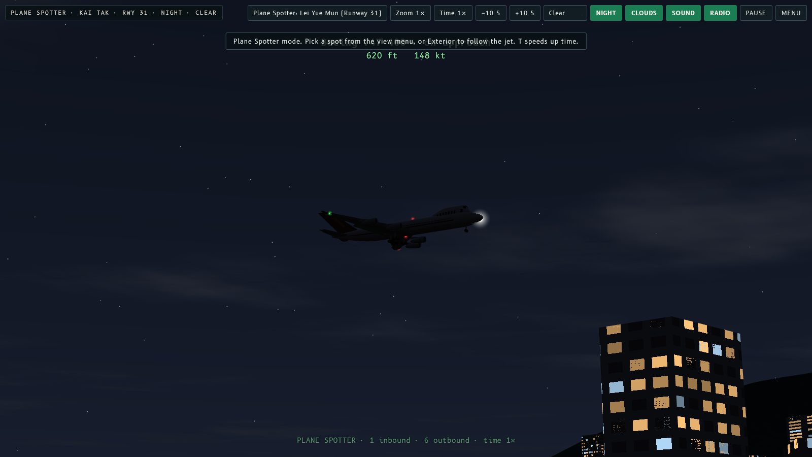 Night view from Lei Yue Mun of a 747 on approach to Runway 31 with its landing lights on.