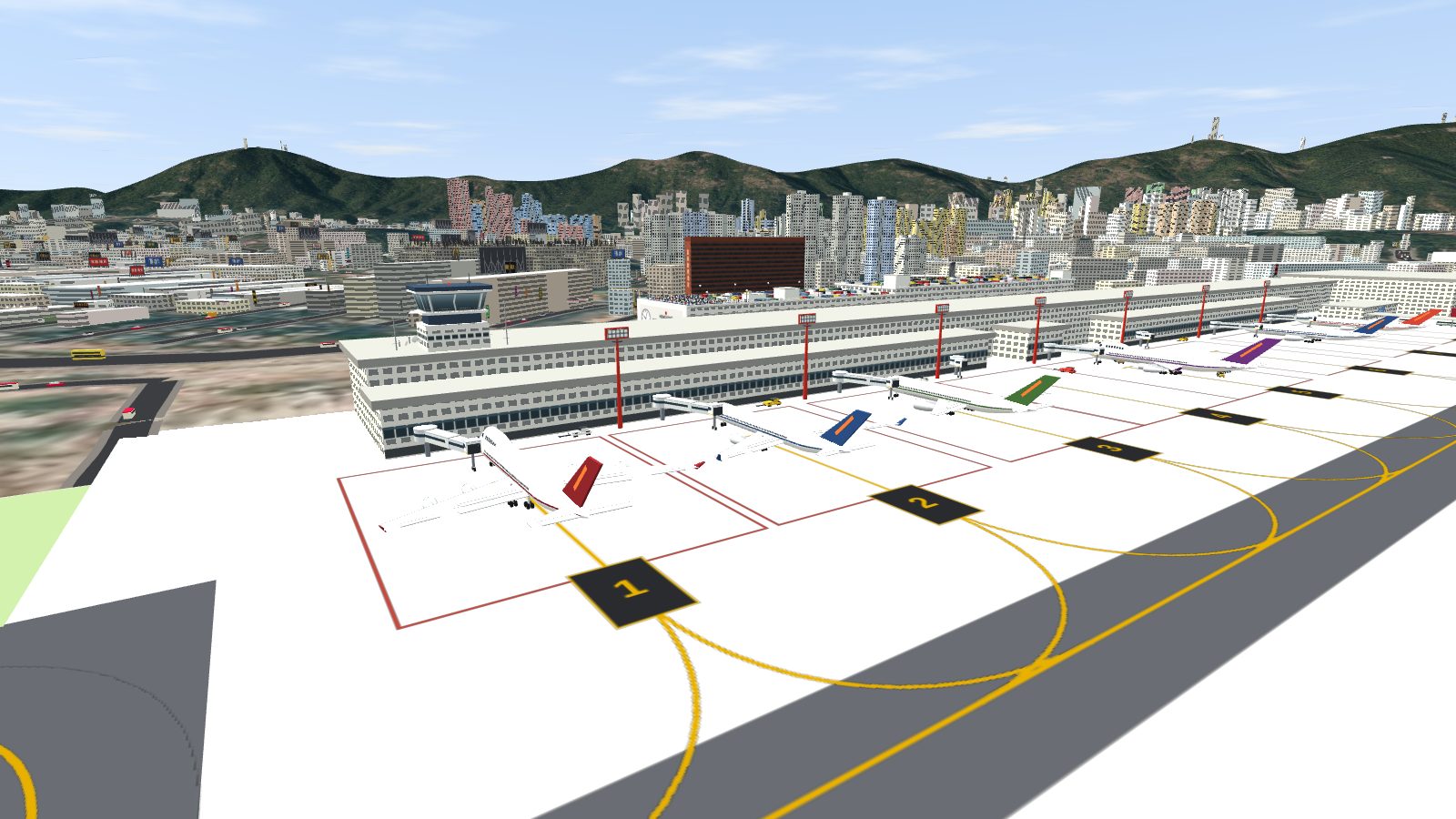 The south-west end of the terminal: a lower gate block standing out from the slab, with jet bridges reaching to aircraft at stands 1 to 4, and the control tower on the slab behind.